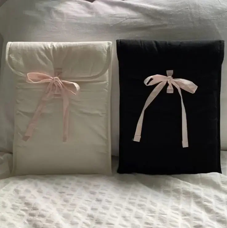 Women’s Ballet Bow Quilted Laptop Bag – Elegant 15” Computer Bag in cream and black with bow detail.