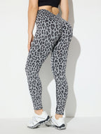 Model showcasing Leopard Print Yoga Pants from the back, highlighting the seamless design and fit.