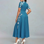Women's Elegant Short Sleeve Maxi Dresses Casual Empire Waist Long Dress in teal with floral design, showing back view.