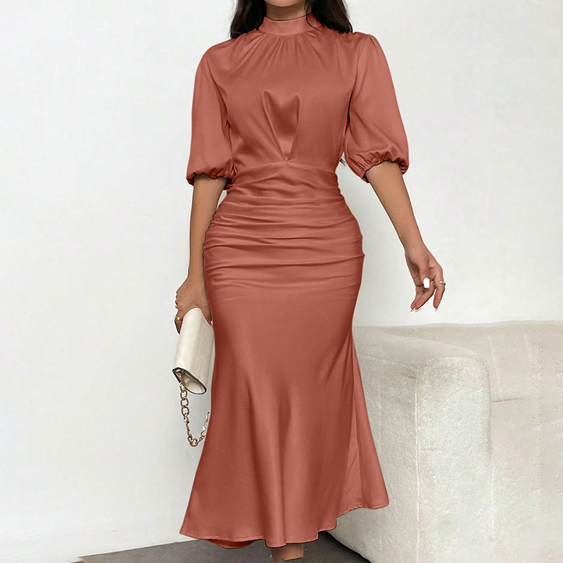 Women's Short Sleeve Ruched Midi Dress Slim Fit Elegant Party worn by a model in a soft rust color, showcasing its stylish silhouette.