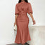 Women's Short Sleeve Ruched Midi Dress Slim Fit Elegant Party worn by a model in a soft rust color, showcasing its stylish silhouette.