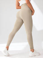 Women's Maternity Leggings Over The Belly Pregnancy Yoga Pants Active Wear Workout Leggings in beige color.