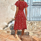 Summer Floral Print Maxi Dress Women Button Up Split Long Flowy Bohemian Beach Party Dresses worn from the back.
