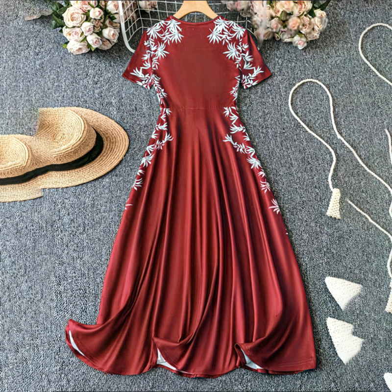 Women's Elegant Short Sleeve Maxi Dresses Casual Empire Waist Long Dress in maroon with floral embroidery detail.