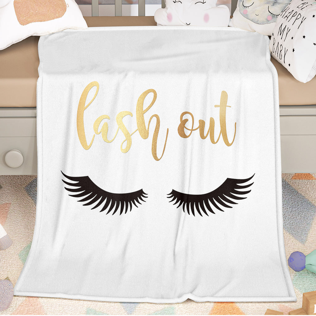 Flannel Velvet Blanket Long Eyelashes with lash out text and eyelash graphic on a soft white surface.