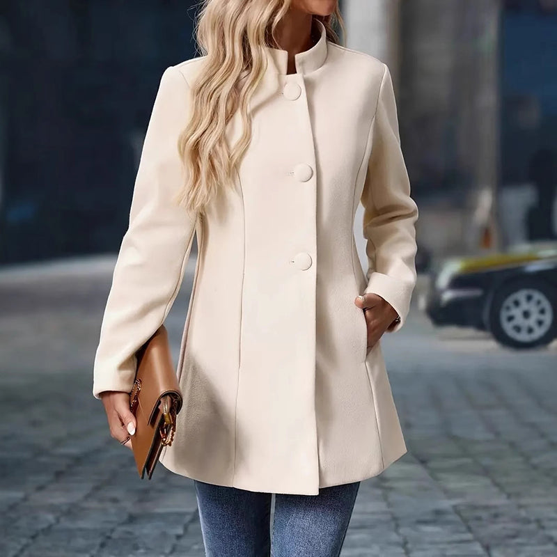 Womens Elegant Single Breasted Coat Long Sleeve Mid Winter Overcoat Work Office Coats in cream color worn with jeans.