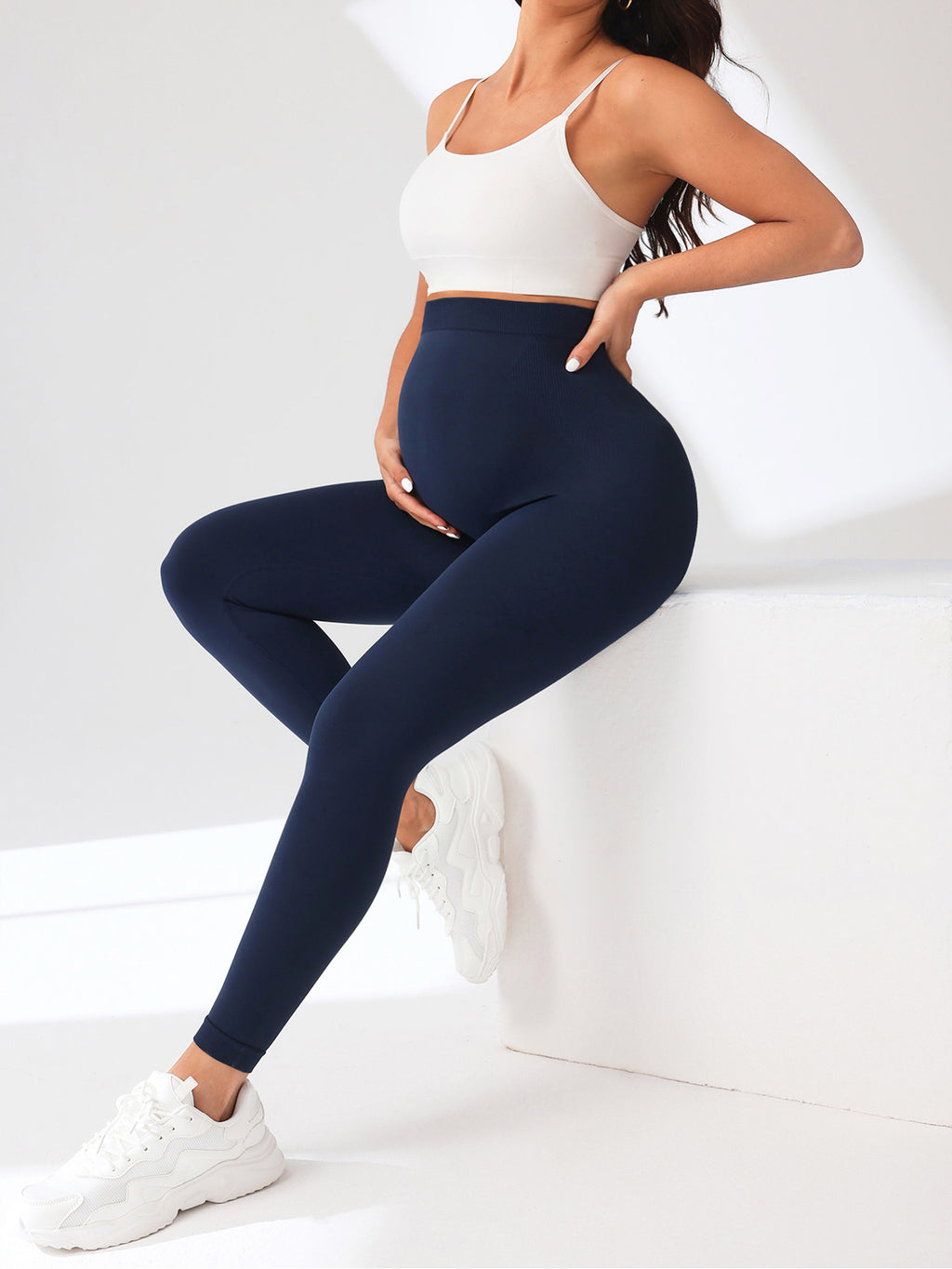 Women's Maternity Leggings Over The Belly Pregnancy Yoga Pants Active Wear Workout Leggings in navy with a fitted design.