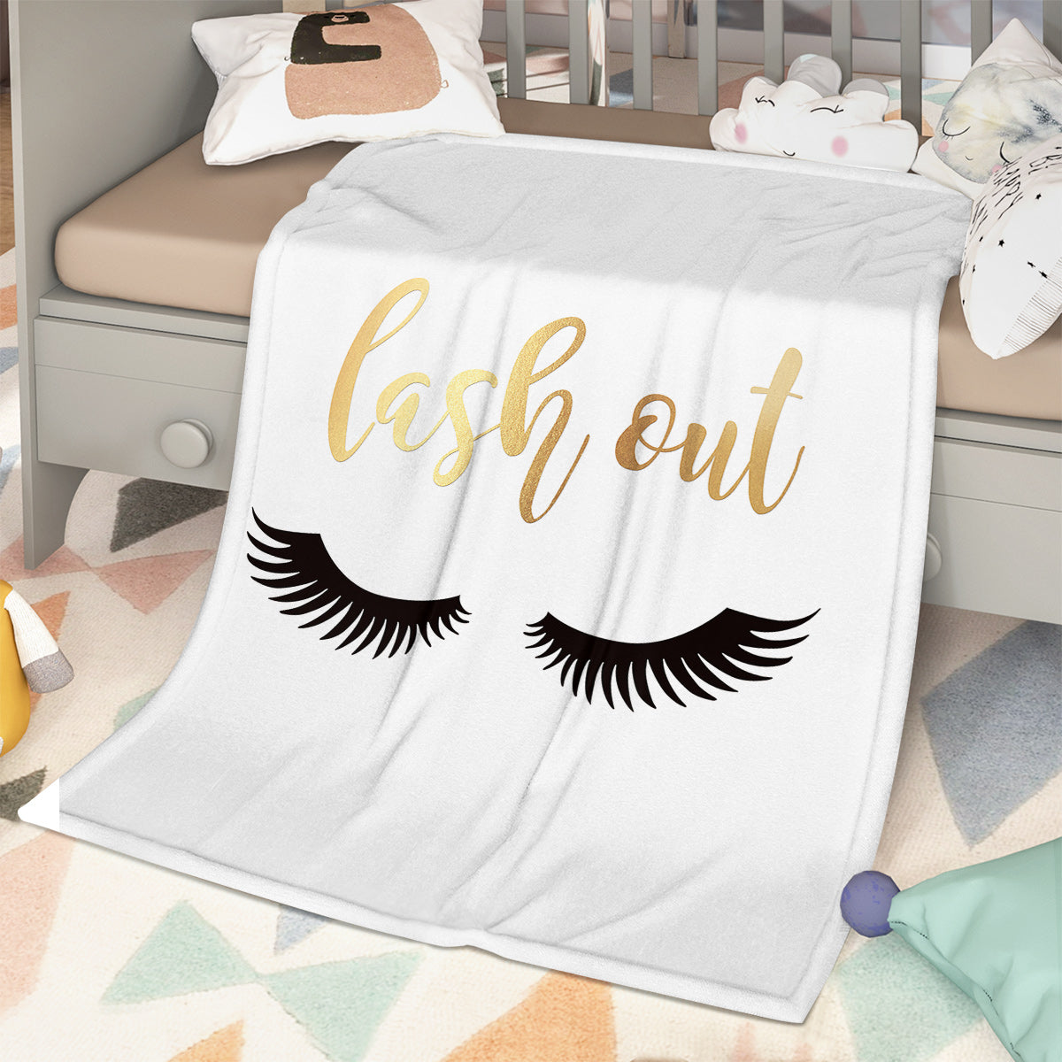 Flannel Velvet Blanket Long Eyelashes with graphic design featuring 'lash out' text and long eyelashes pattern.