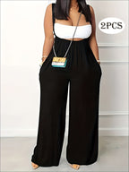 Plus Size Solid Color Pocket Overalls Casual Women's Pants in black with stylish cut and practical pockets.