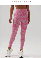 Model showcasing Leopard Print Yoga Pants in pink with a seamless design for yoga and active lifestyle.