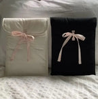 Women’s Ballet Bow Quilted Laptop Bag – Elegant 15” Computer Bag in cream and black with bow detail.