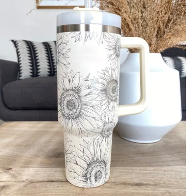 40oz Insulated Stainless Steel Tumbler Handle Straw Lid with floral design on a wooden table.