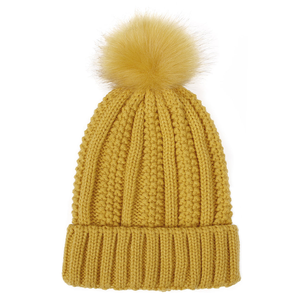 Winter Knitted Hats Fashion Stretchy Lined Skull Hats For Women Faux Fur Pom Pom Hat Keep Warming Beanie Hat in yellow color.