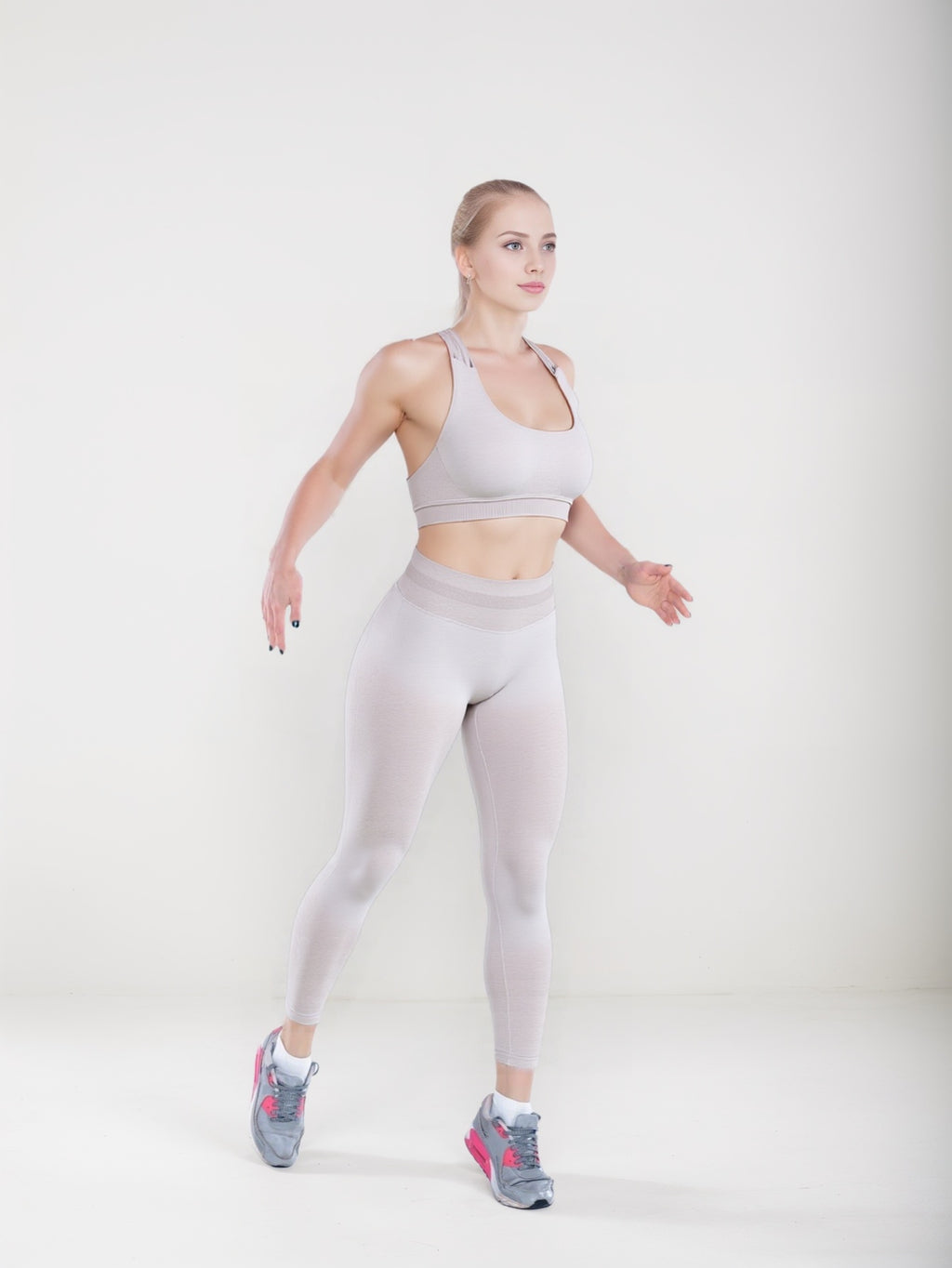 Woman demonstrating fitness pose in Solid-color Yoga Pants Sport Yoga Pants for workouts and casual wear.