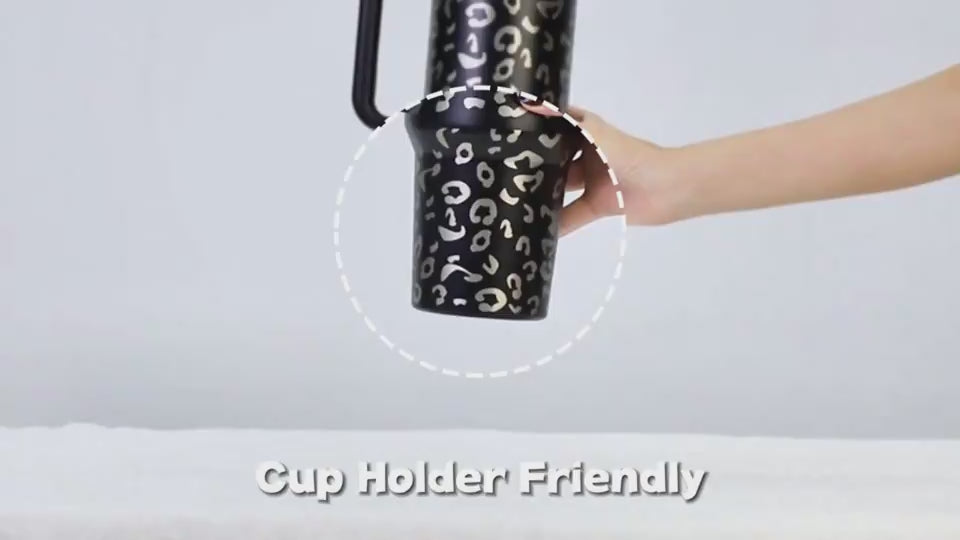 40oz Insulated Stainless Steel Tumbler Handle Straw Lid being held, showcasing cup holder friendly design.