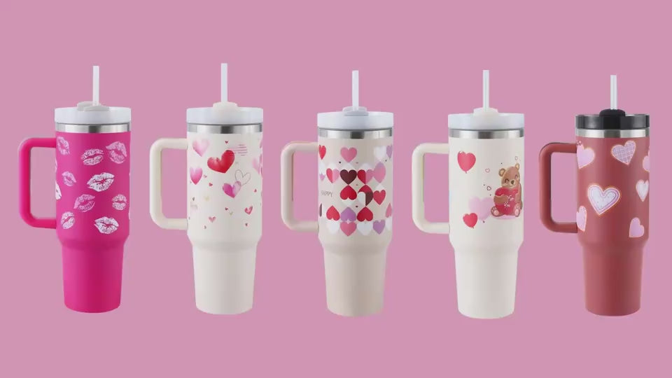 Various designs of 40oz Insulated Stainless Steel Tumblers with handles and straws against a pink background. Main image